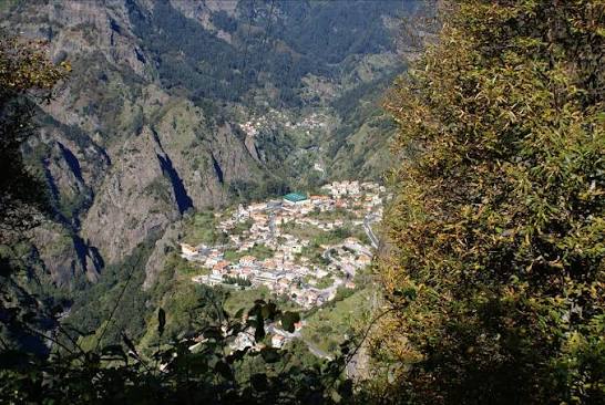 Curral das Freiras village in the Nuns Valley, surrounded by steep mountains
